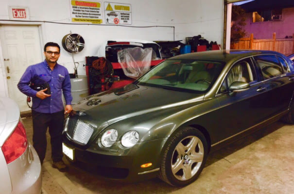 A Bentley Flying Spur in for service